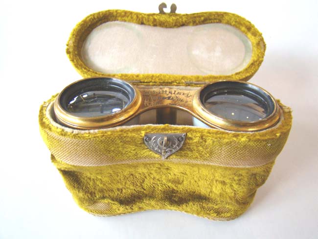 A fine pair of Presentation Opera Glasses dated 1886 with its' original velvet purse case